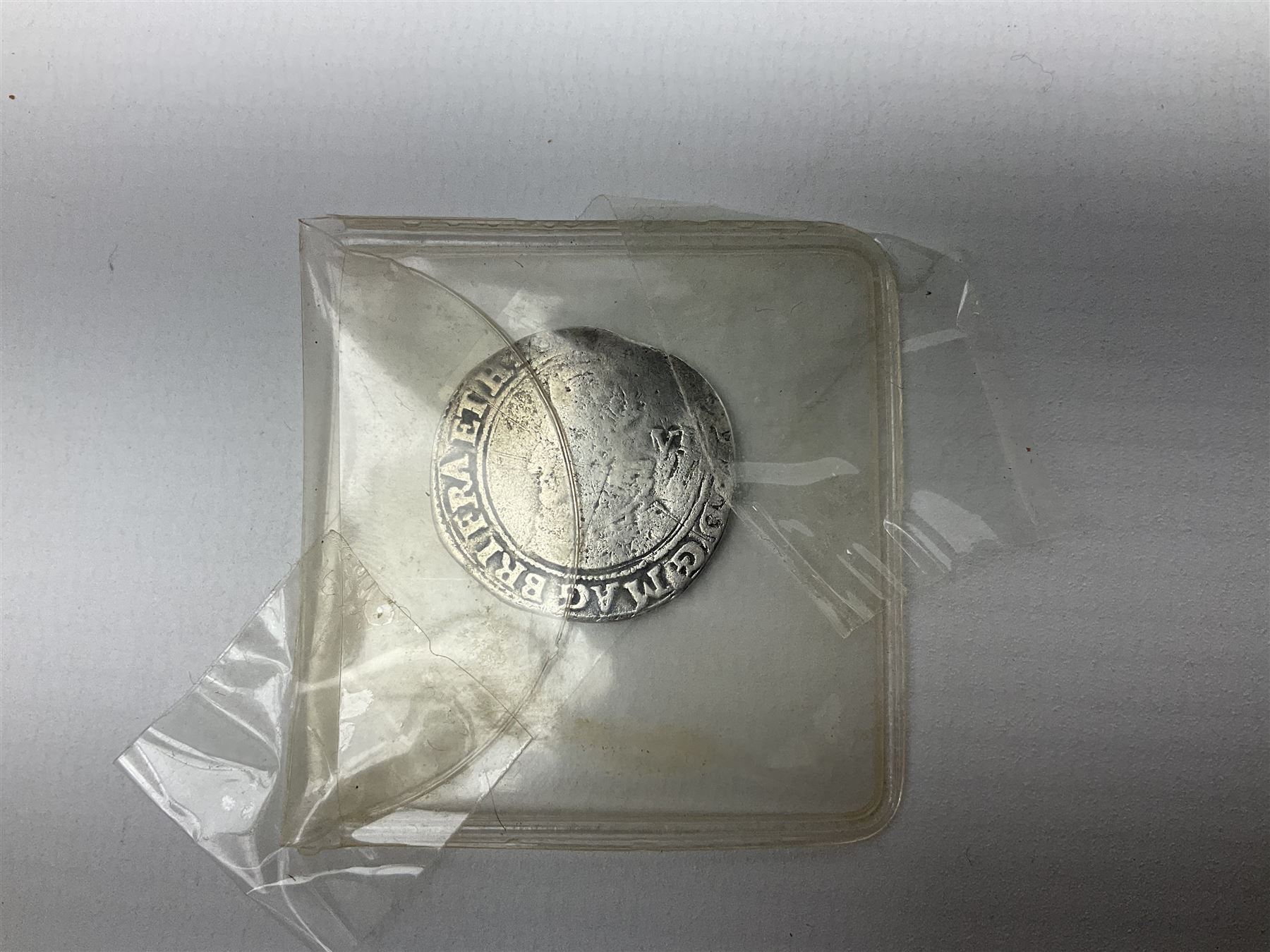 Charles I 1625 hammered silver sixpence, Queen Victoria 1894 crown coin and a cased hallmarked silver medal for the Hull photographic society, engraved '1940' 'Leonard Vokes', all housed in a red Pobjoy Mint coin box