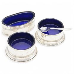 Group of silver cruet items, comprising pair of Art Deco salt and pepper shakers, of tapering cylindrical form, hallmarked Viner's Ltd, Sheffield 1933, pair of silver open salts, pair of salt shaker, and a matching pepper shaker and open salt, all hallmarked