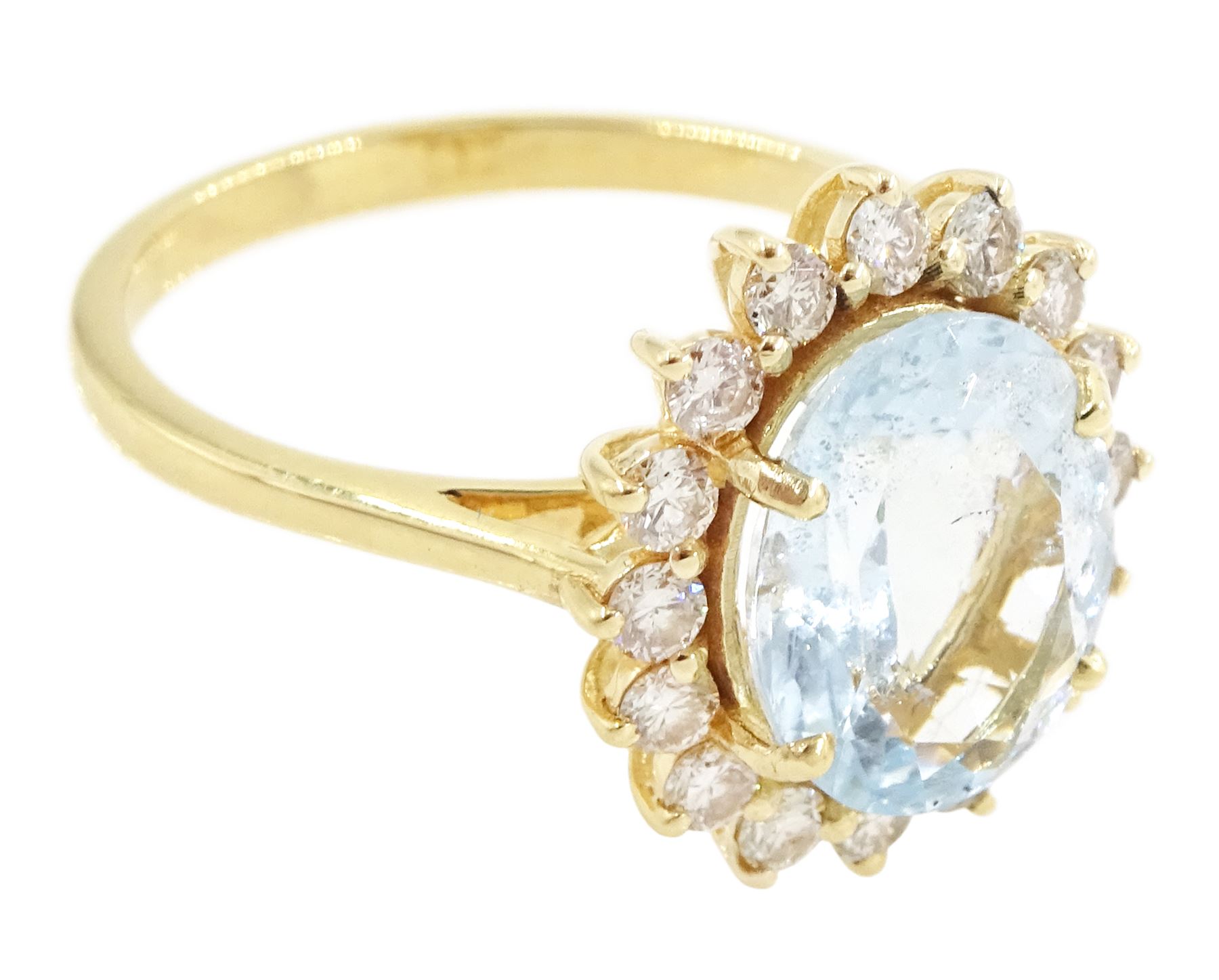 18ct gold oval cut aquamarine and round brilliant cut diamond cluster ring, stamped, aquamarine approx 2.20 carat, total diamond weight approx 0.50 carat