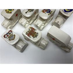 Ten WW1 crested china military models comprising seven field ambulances and three 'Home Fires Burning' fire-surrounds/range; various makers including Willow Art, Arcadian China, Grafton China, Savoy China, Carlton China etc; various crests including Devon, Aldershot, Portsmouth, West Ham, Coventry, Oxford, Hastings, Brighton etc (10)