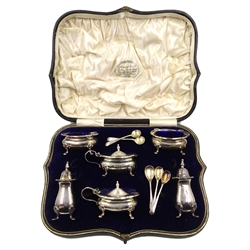  Six piece silver condiment set by Collingwood and Sons Birmingham 1915 boxed and five odd spoons approx 8oz  