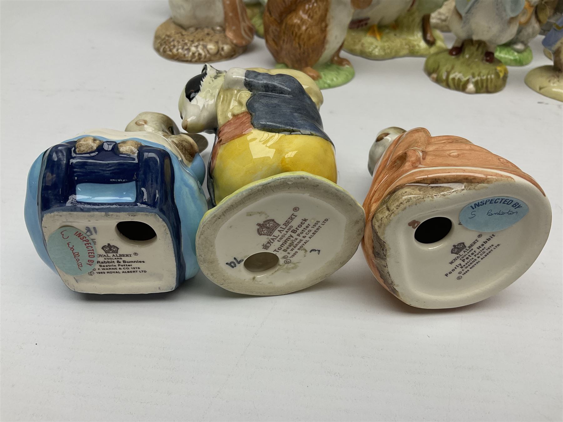 Sixteen Royal Albert Beatrix Potter figures, including Poorly Peter Rabbit, Jemima Puddle Duck and Squirrel Nutkin etc, all boxed together with a Beswick Beatrix Potter Jeremy Fisher miniature jug and four Beswick Wind in the Willows figures 