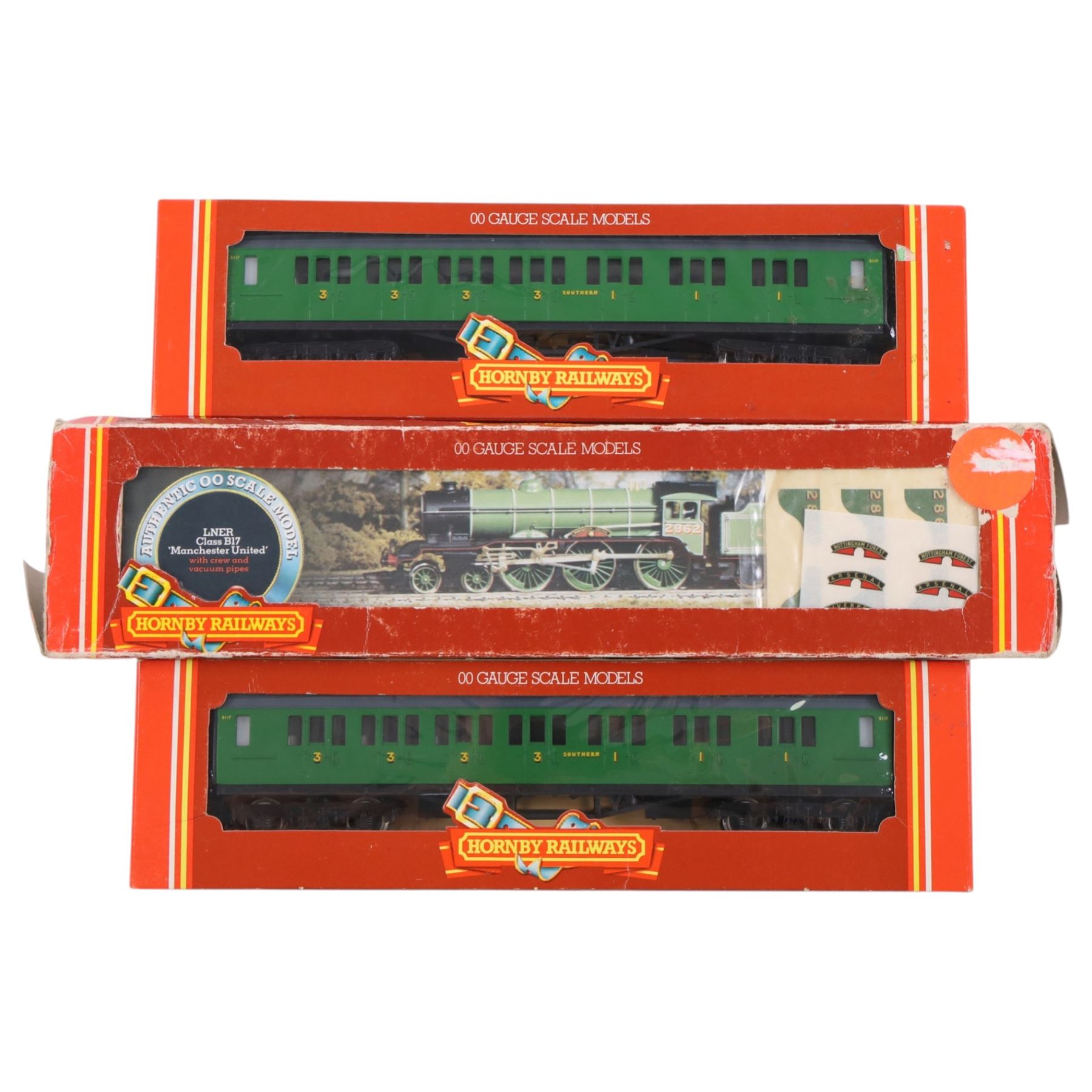 Three boxed 00 gauge Hornby locomotives, two unboxed 00 gauge locomotives, including Bachmann Class A1 Tornado, two Hornby composite coaches, Hornby breakdown crane and an empty Bachmann presentation box