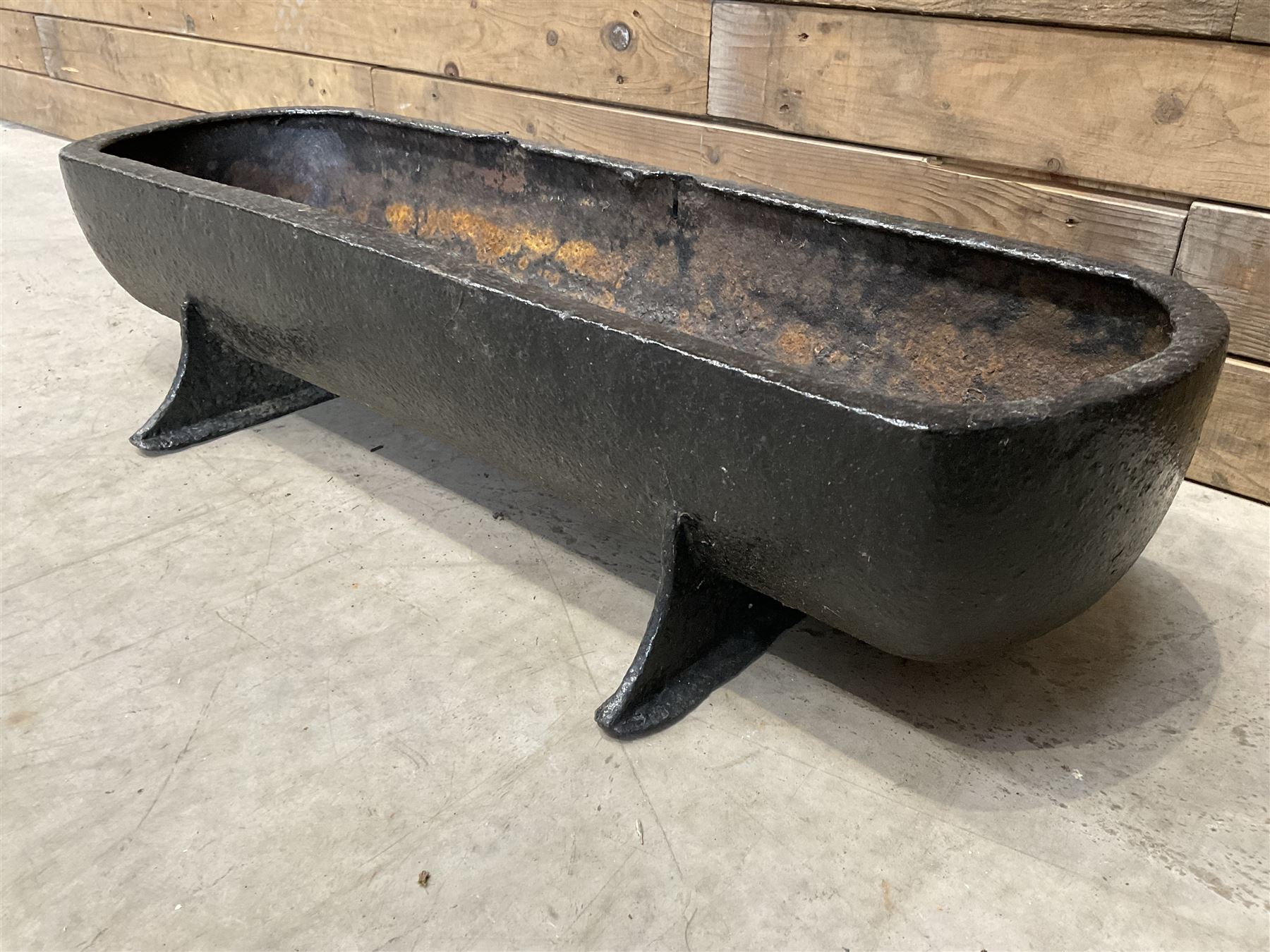 19th century oval black painted cast iron feeding trough planter