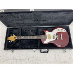 Gibson Marauder style six-string electric guitar with cherry coloured body, marked made in Japan L101cm; in locking hard carry case