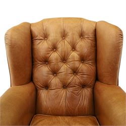 TETRAD for John Lewis - brown leather upholstered wingback armchair, button back with diamond tufted detail, loose seat cushion with piped edge, scroll arms and padded side wings, on short supports