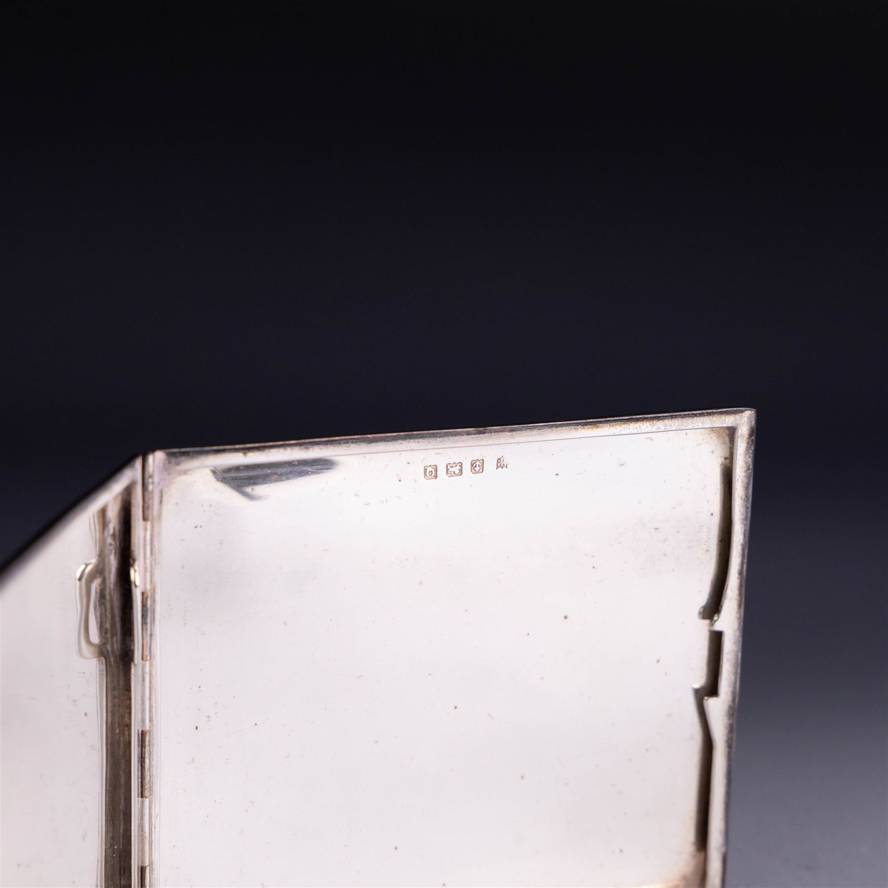 1940s silver cigarette case, of rectangular form with engine turned decoration, hallmarked Ellis & Co, Birmingham 1940, H8.5cm, W10cm