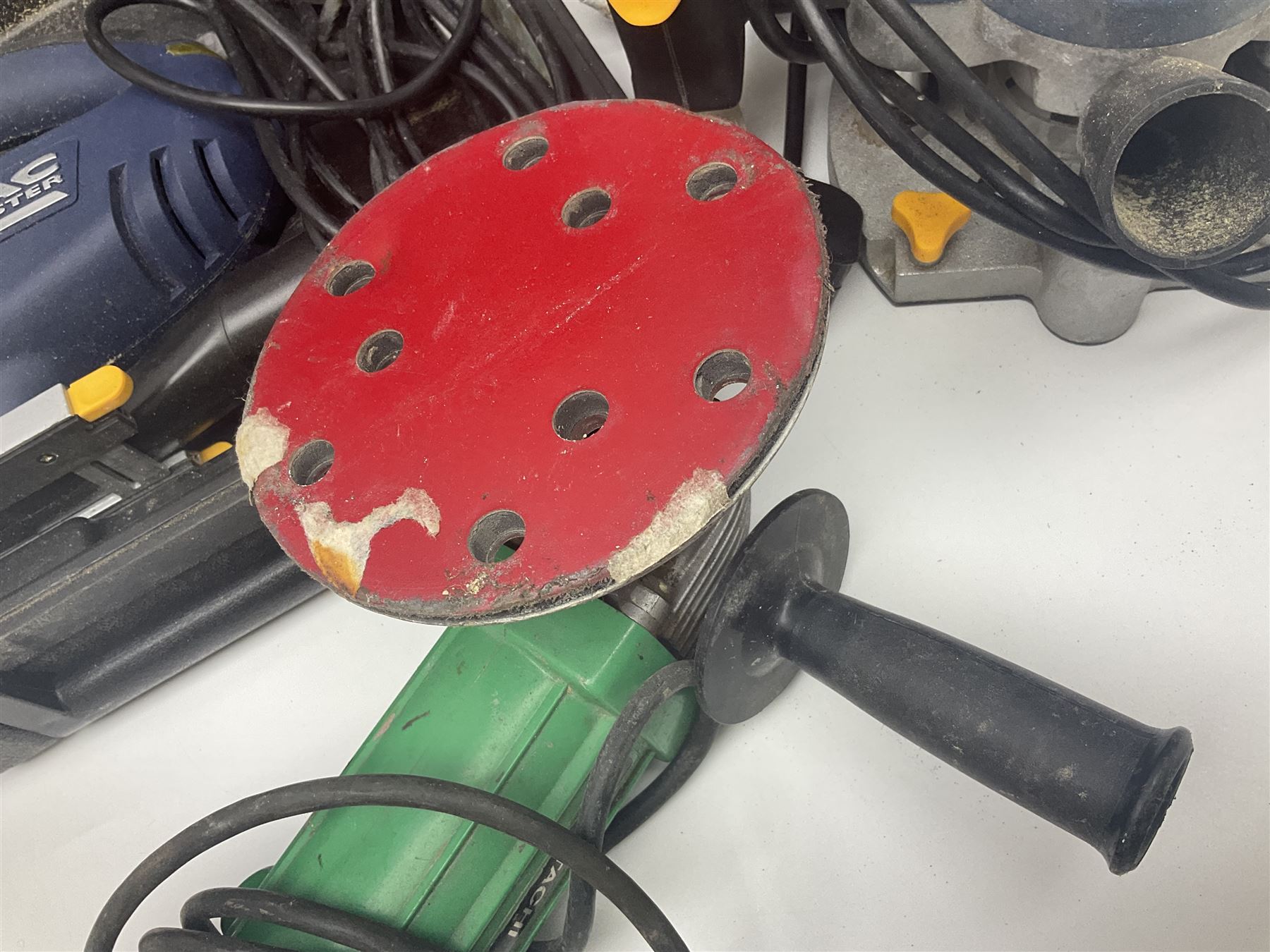 Collection of tools, comprising grinder electric, cased Mac Allister jigsaw, Power craft router