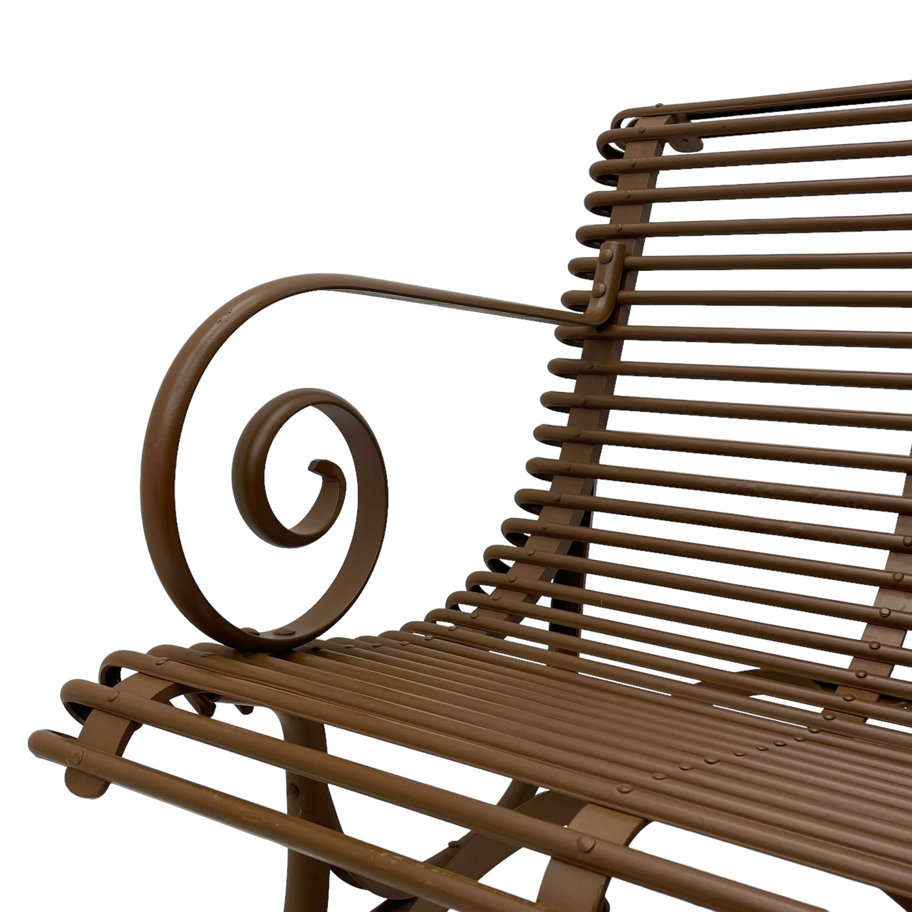 Painted wrought metal 'Arras' chair, curved frame with horizontal rails and scrolled arms, on hoof feet, in russet brown paint finish, with brass plaque 'Usine, S. Sauveur, Arras' 