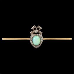 Edwardian gold and silver opal and diamond heart cluster brooch, central oval cut opal sur...