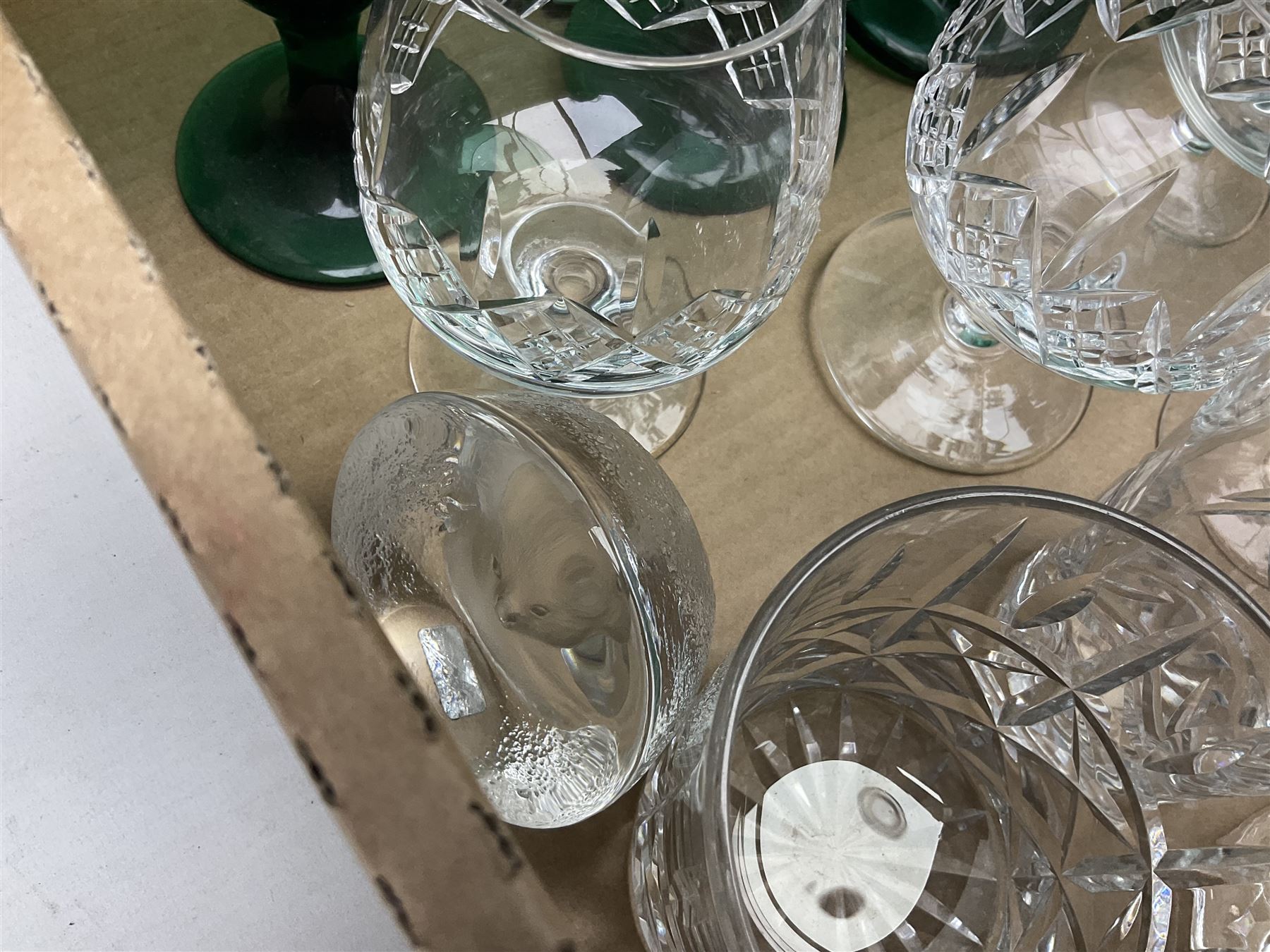 Quantity of glassware to include Mats Jonasson koala paperweight, set of six Stuart drinking glasses, seven green wine glasses with ovoid bowls, decanter, brass lamp etc