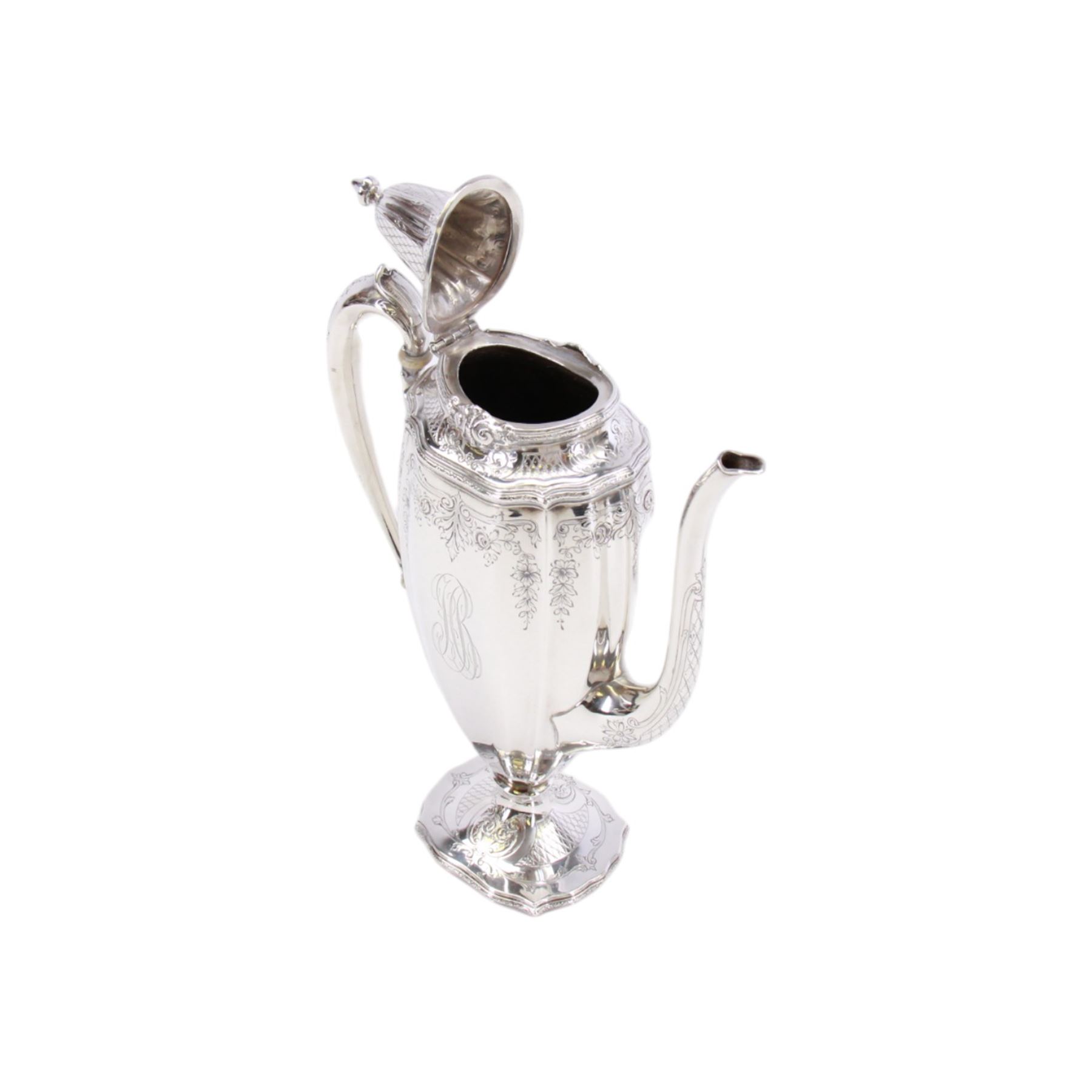 Early 20th century American silver three piece coffee service, comprising coffee pot with ivory insulators to the handle, twin handled sucrier, and cream jug, each of part reeded form chased with foliate swags and bands, each marked for Black, Starr & Frost, New York, also stamped Sterling, Chippendale Exclusive Design, coffee pot H27cm, including handles sucrier H12, including handle cream jug H15.5cm

This item has been registered for sale under Section 10 of the APHA Ivory Act