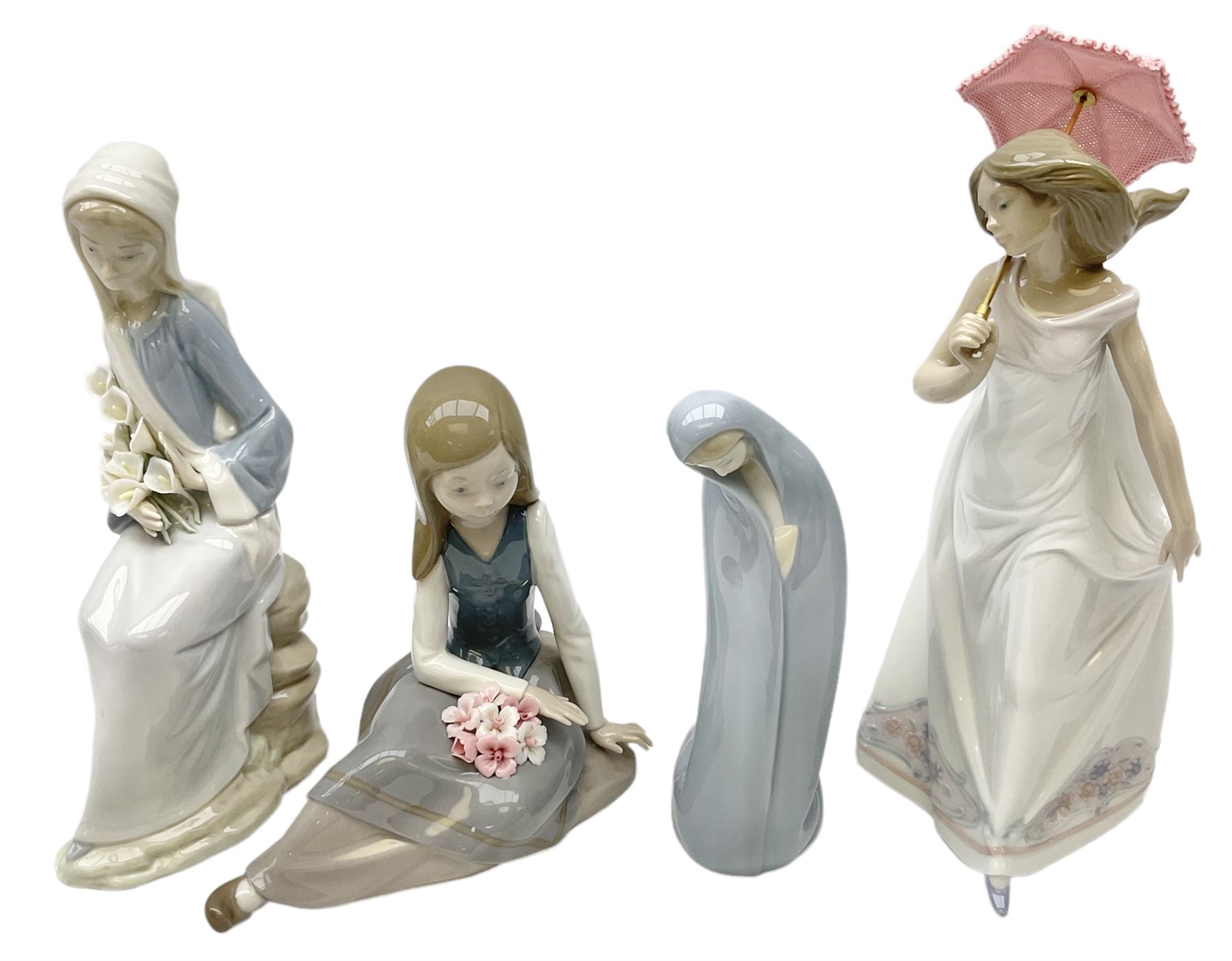 Four Lladro figures, comprising Afternoon Promenade no 7636, Nostalgia no 5071, both with original boxes, Girl with Lilies no 4972 and Madonna no 4534, largest example H27cm