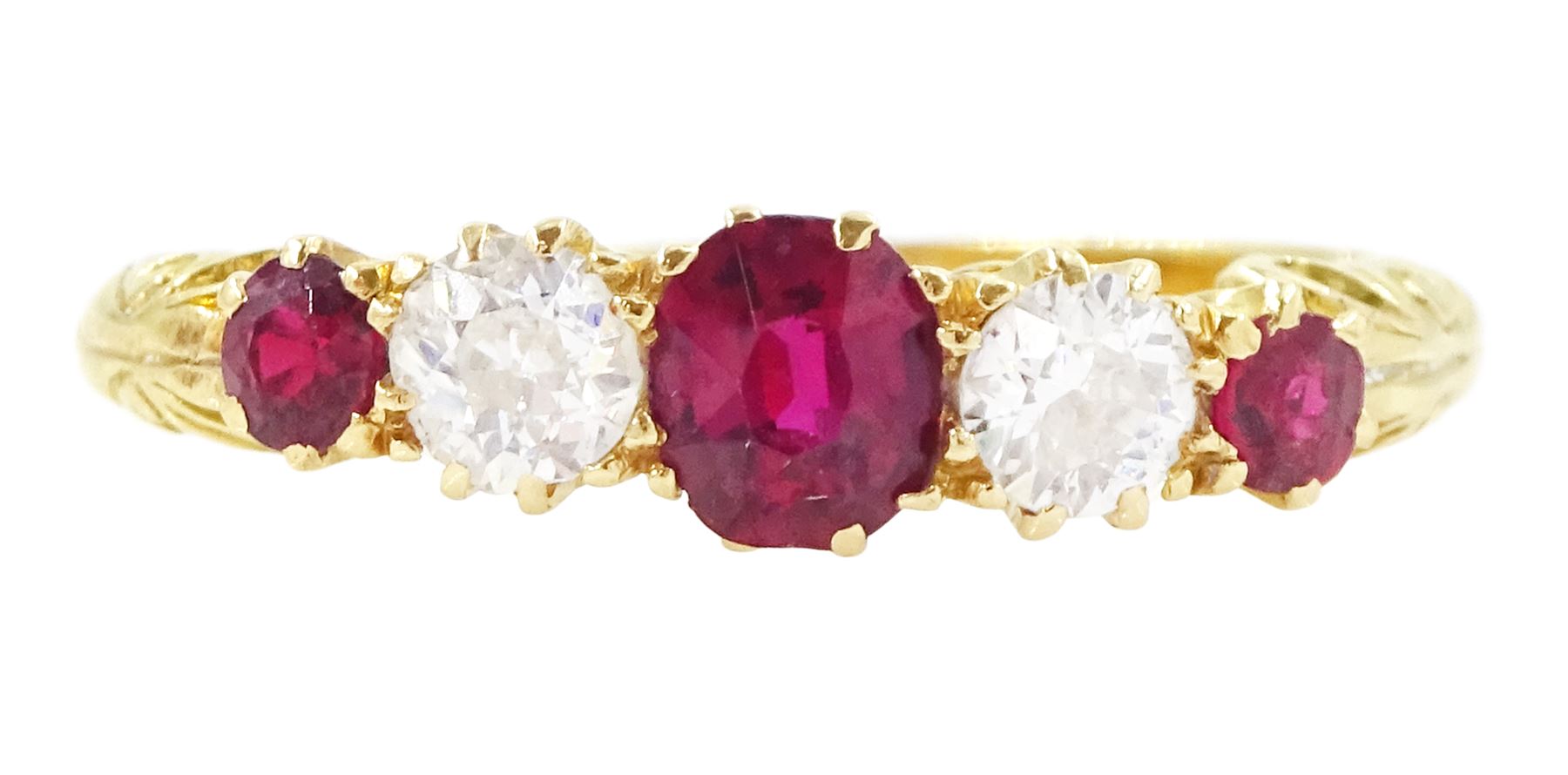 Early 20th century 18ct gold ruby and diamond five stone ring, three oval and round cut rubies, spaced by two old cut diamonds, stamped 18, total ruby weight approx 0.55 carat, total diamond weight approx 0.30 carat