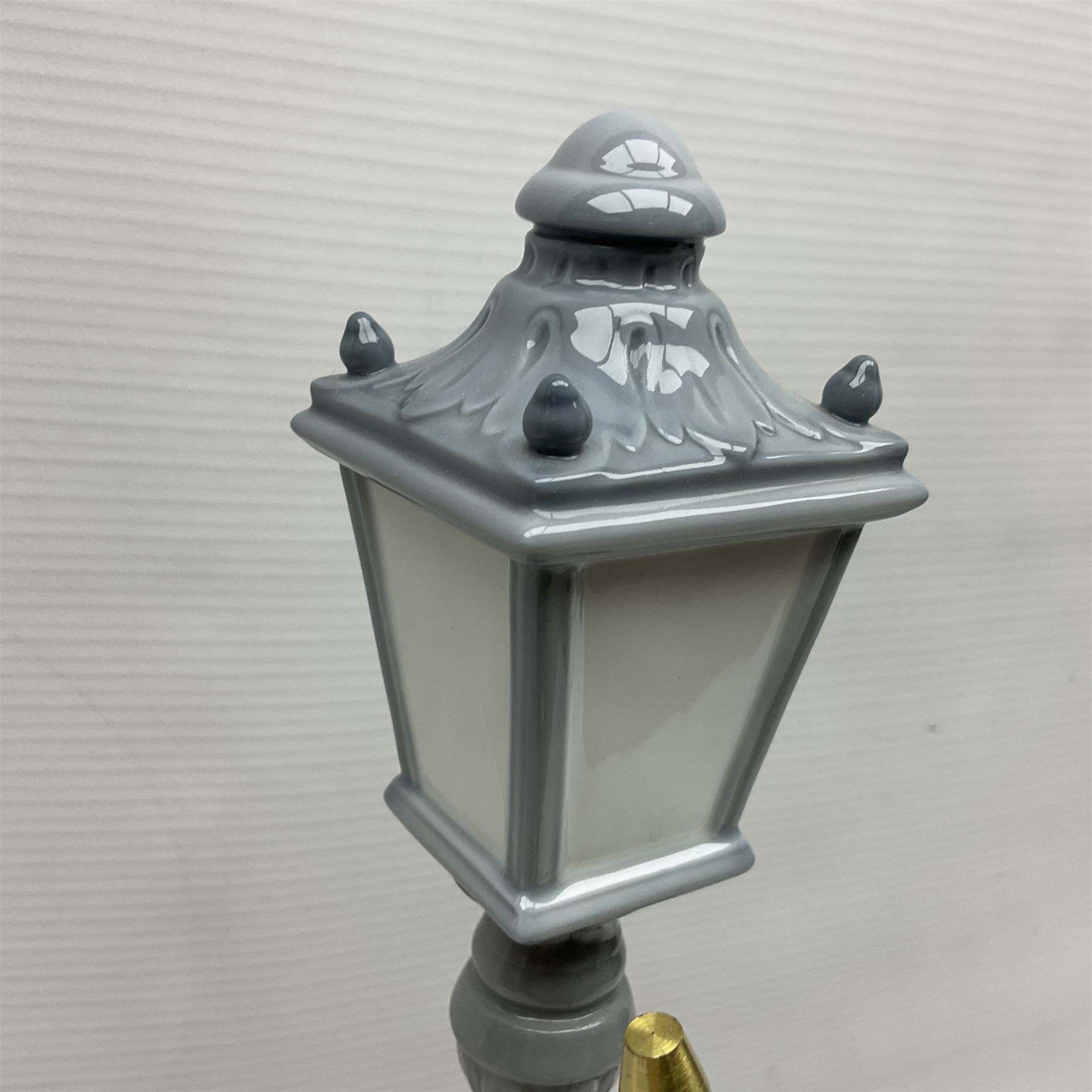 Five Lladro figures, including The Lamp Lighter no 5205,  Girl and Kittens no 6102, Cat no 5113 etc