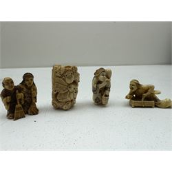 Nine wooden and composite carved netsukes, to include dog, horse and monkey, female figure etc 