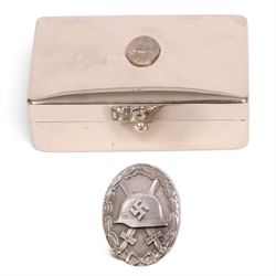 WWII German Third Reich 'silver' wound badge, numbered verso L22, together with a silver p...