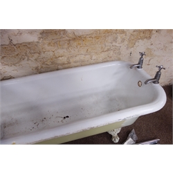  Victorian style cast iron roll top enamelled bath, on ball and claw feet (W74cm, H60cm, L183cm) with chrome finish curtain and hand rail  