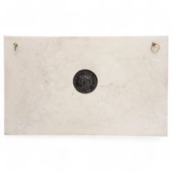 Composite plaque, depicting Sprites in a garden, with inset 'Arts and Commerce Promoted' medallion to reverse, 20cm x 33cm; together with a moulded glass Claret jug with silver plated mount H30cm 