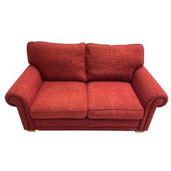 Two seat metal actions sofa bed upholstered in red cover