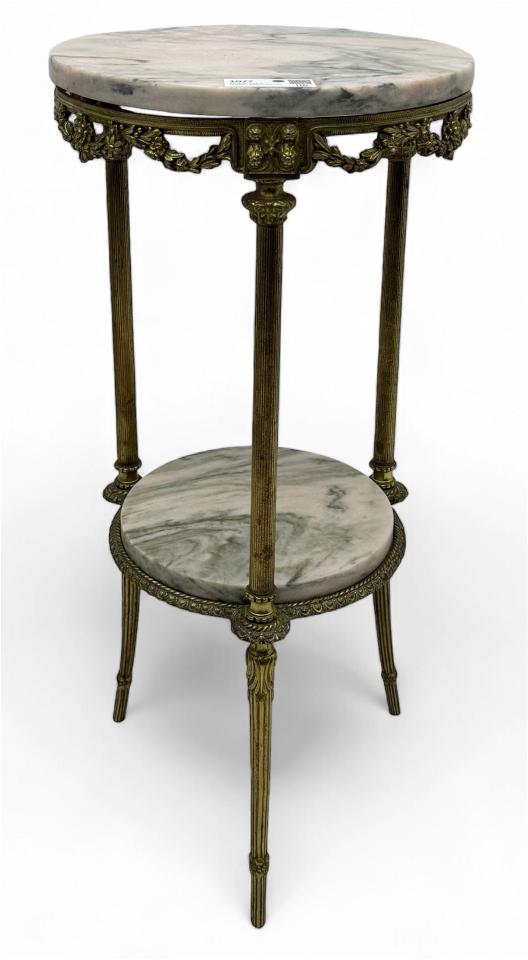 Late 20th century cast gilt metal and marble two-tier stand, pink and grey marble top and undertier, the base decorated with floral garlands, on reed moulded supports with splayed terminals 