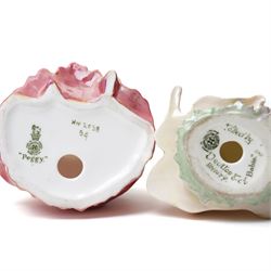 Seven Royal Doulton figures, comprising Chloe HN1470, A Victorian Lady HN727, Tinkle Bell HN1677, Babie HN1679, Lily HN1798, Peggy HN2038, The Rag Doll HN2142 (7)