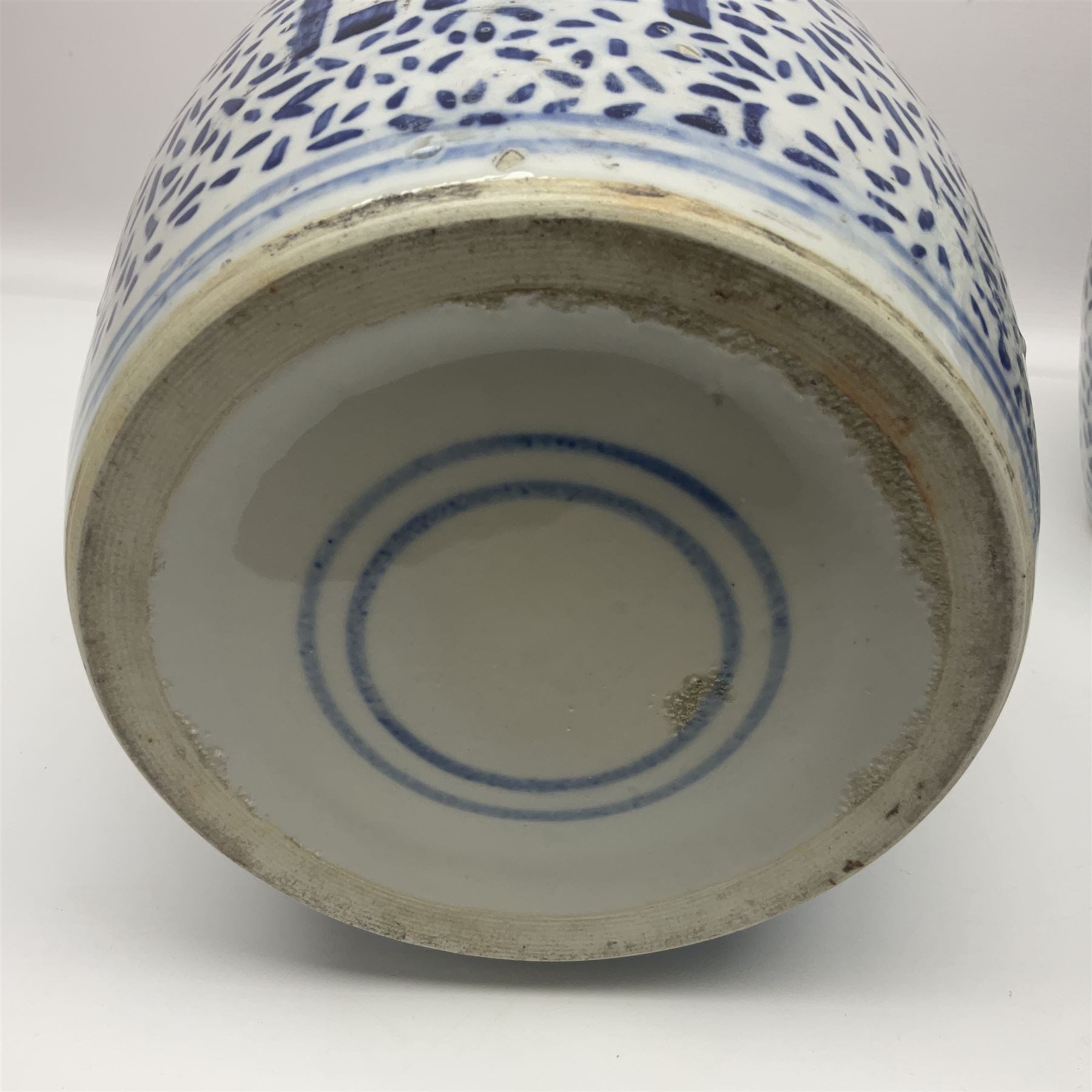 19th century Chinese ginger jar with blue and white painted landscape scene, together with a pair of larger Chinese ginger jars, one with cover, painted with blue and white Double Happiness decoration,  each with concentric circles painted beneath, tallest H24cm