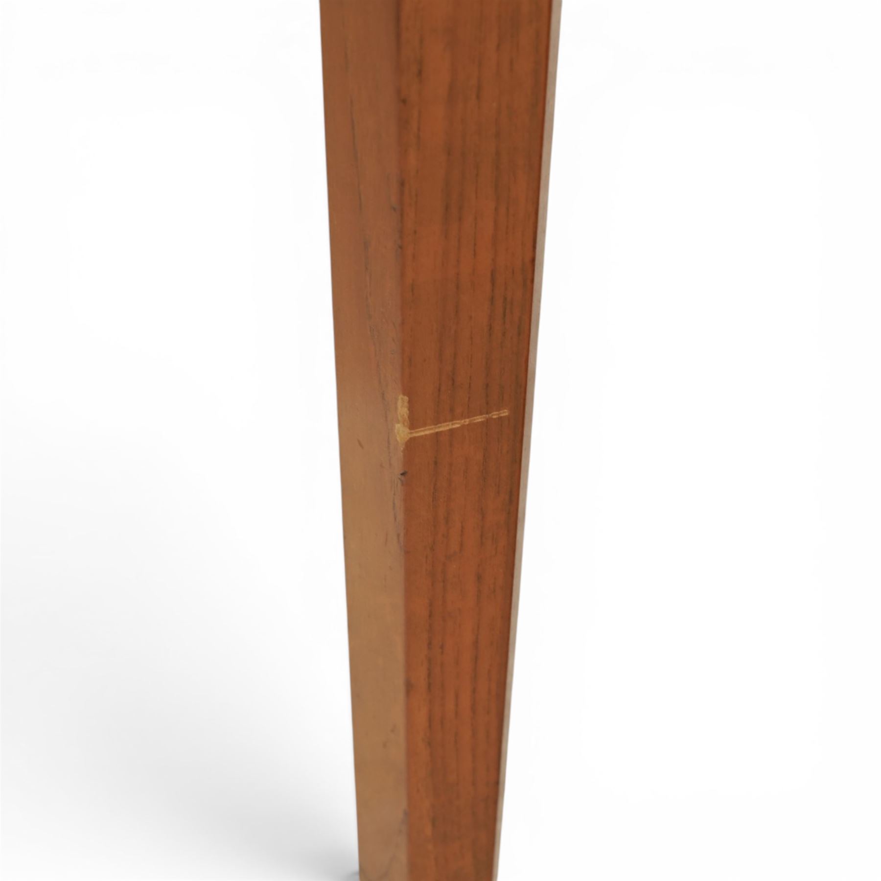 Mid-20th century teak dining table and chairs, with stowable fold over leaf, raised on square tapering legs, the chairs with teak frames and reupholstered green leather seats