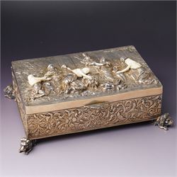German 800 standard silver gilt and ivory mounted box, the hinged cover embossed and chase...