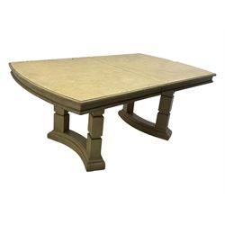 Brunswick - washed oak finish extending dining table, rectangular top with curved ends and carved frieze, central extension leaf, raised on twin pedestals with arched plinth bases and square-sectioned column supports; set of eight (6+2) high-back dining chairs upholstered in beige velvet fabric