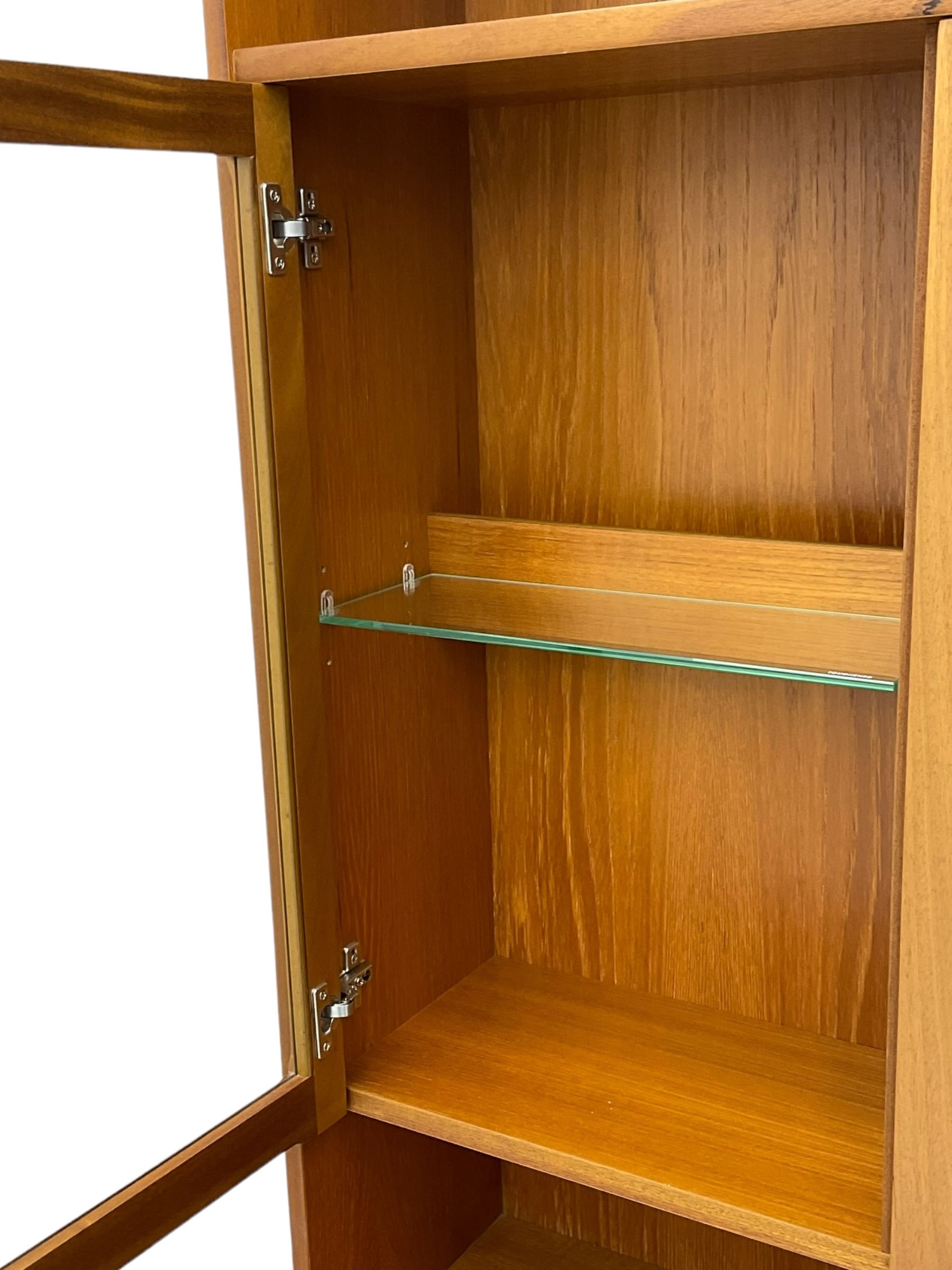 Nathan - teak wall display cabinet, enclosed by three glazed doors, fitted with four drawers and three cupboards 