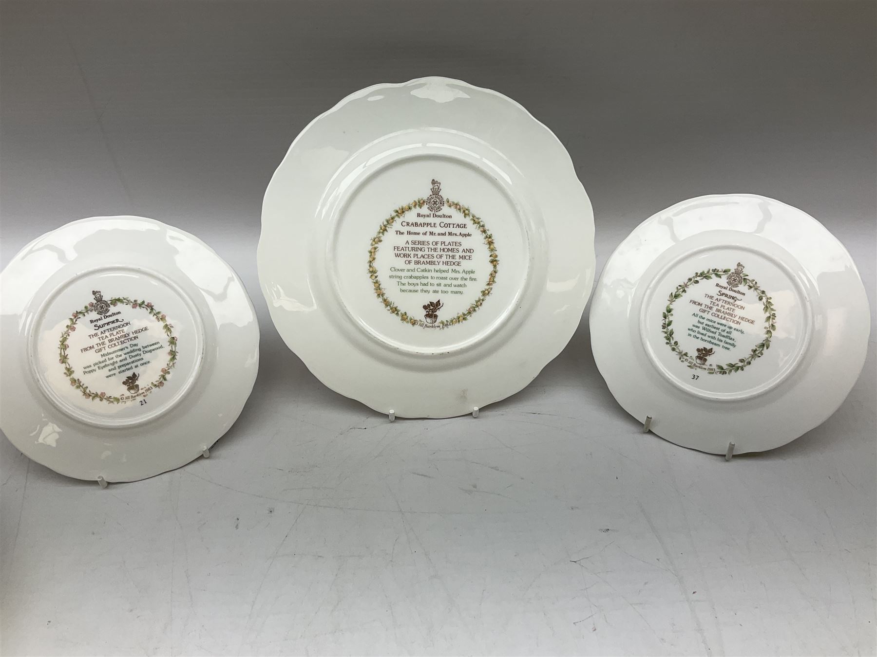 Royal Doulton Brambly Hedge plates comprising Crabapple Cottage, Spring and Summer, together with Royal Doulton Bunnykins nursery plate, bowl, cup etc