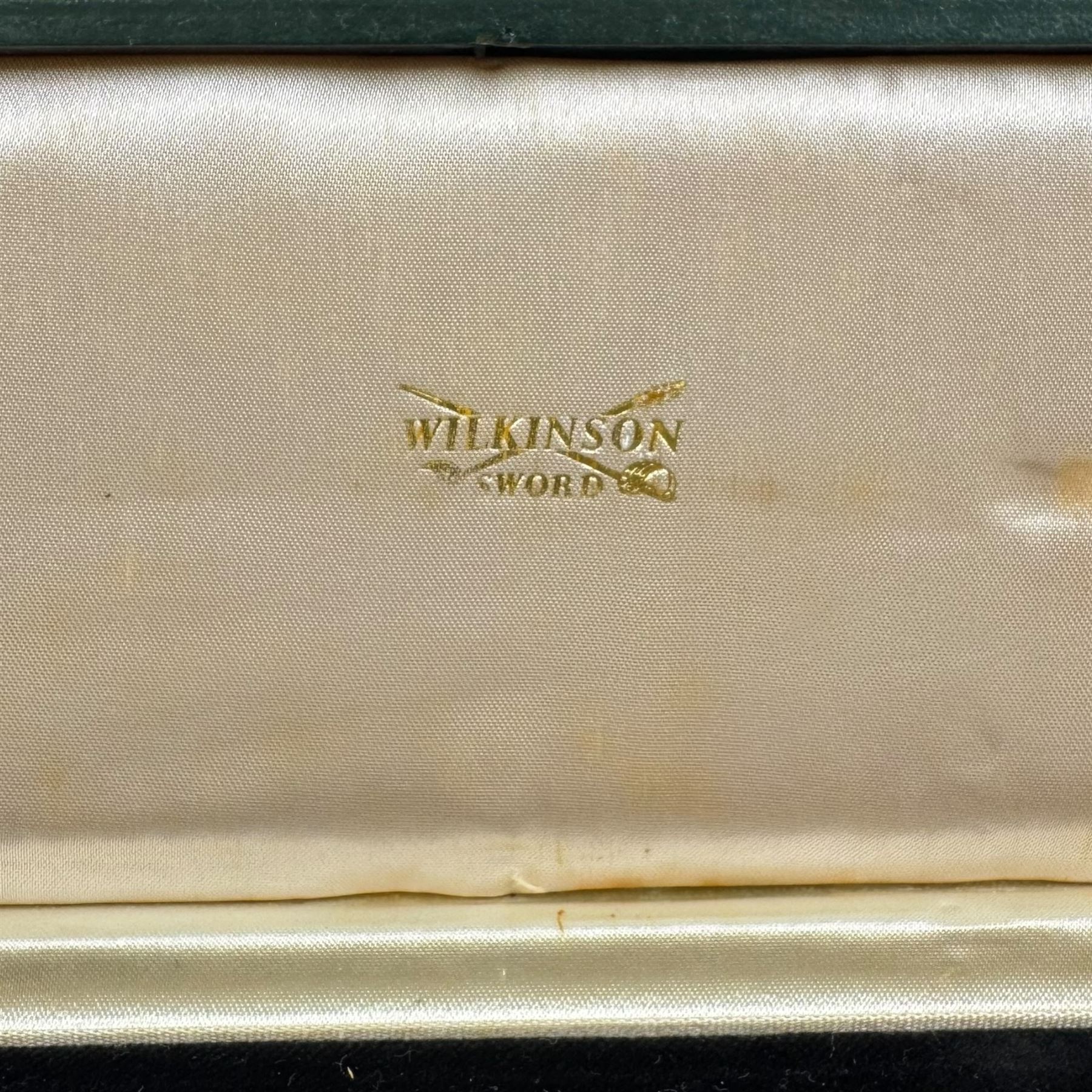 Wilkinson Sword letter opener, inscribed 'By Appointment of Her Majesty', in presentation box 30cm x 10.5cm