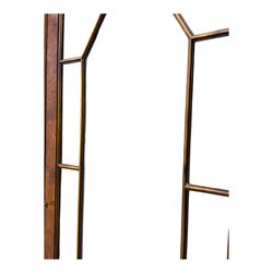 Ian Smith Furniture - Georgian design walnut bookcase on cupboard, projecting cornice above a pierced geometric frieze, featuring two astragal-glazed doors enclosing two adjustable shelves, the base with two drawers above a double cupboard, on a shaped plinth base