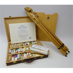  Winsor & Newton picture easel, Artists paint box containing various oils, some unopened, paint pallet & canvas    