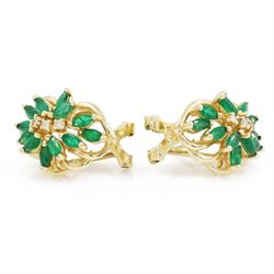 Pair of 14ct gold emerald and diamond cluster earrings, each stud set with twelve marquise cut emeralds and three round brilliant cut diamonds, stamped 585