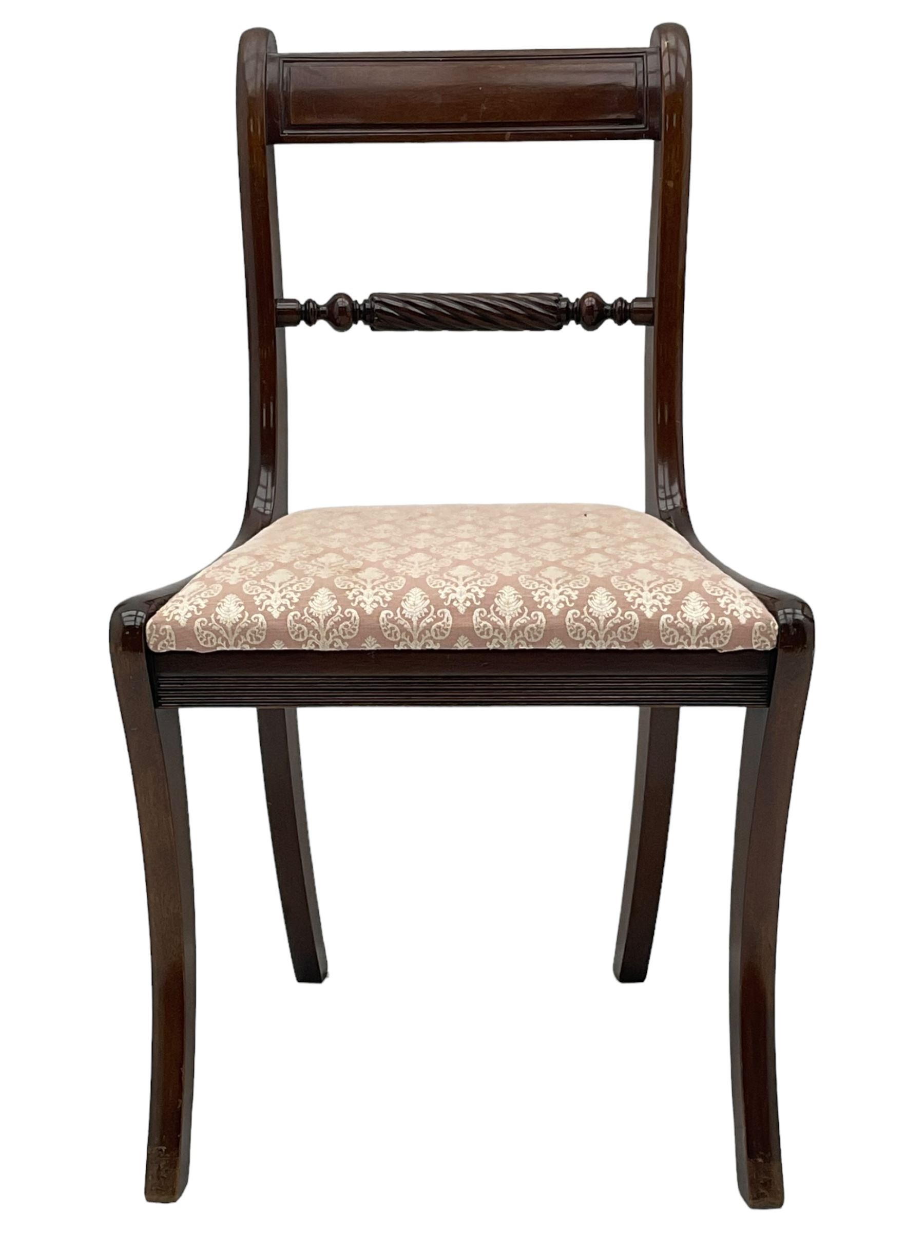 Regency design mahogany extending dining table, rectangular top with extending canted corners, pull-out action with additional leaf (84cm x 136cm - 182cm, H76cm); set of eight Regency design mahogany dining chairs with rope twist rails