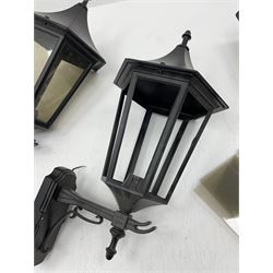 Pair black finish metal wall hanging outdoor lanterns, faceted tops with finial, and an additional lantern for spares/parts 