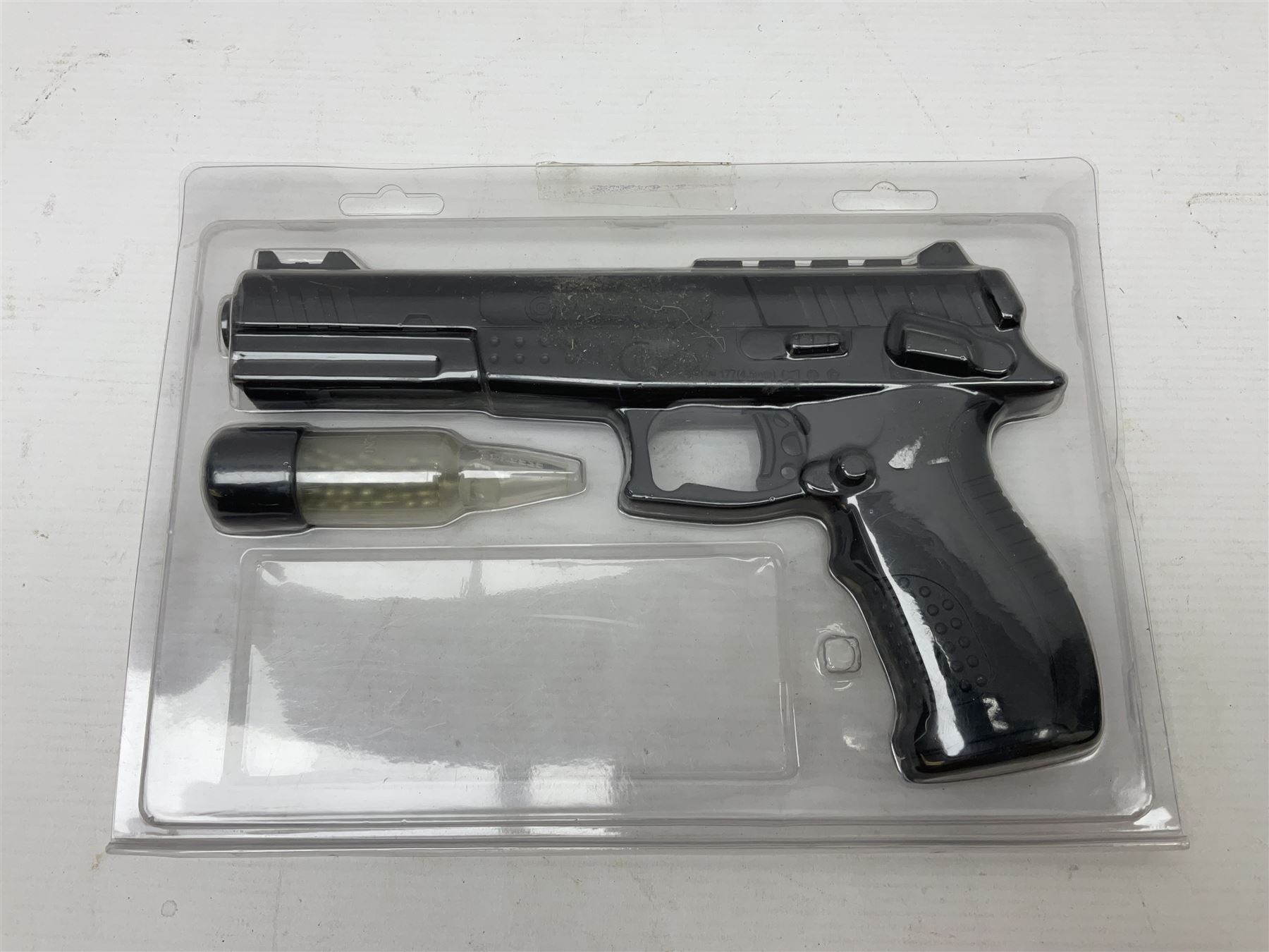 Marksman 1018 spring action BB pistol, serial no.121912951321, L27cm in original packaging with ball dispenser; and KWC .177 cal. CO2 revolver, serial no.31128882, L31cm (2)  NB: AGE RESTRICTIONS APPLY TO THE PURCHASE OF AIR WEAPONS.