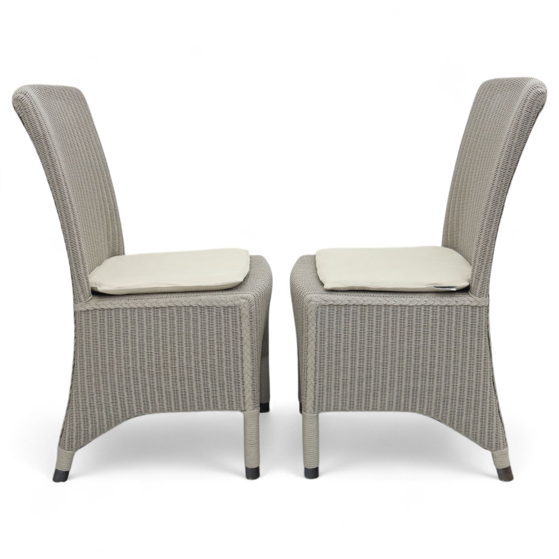 Neptune – Sheldrake limed oak extendable dining table and eight Havan loom chairs, the oval top in limed oak finish with four additional leaves extending the table to seat up to ten (Extends to cm), raised on turned legs with two additional centre supports, the matching Havan loom chairs finished in grey with cream upholstered seat covers (H 95cm, W 47cm, D 55cm)