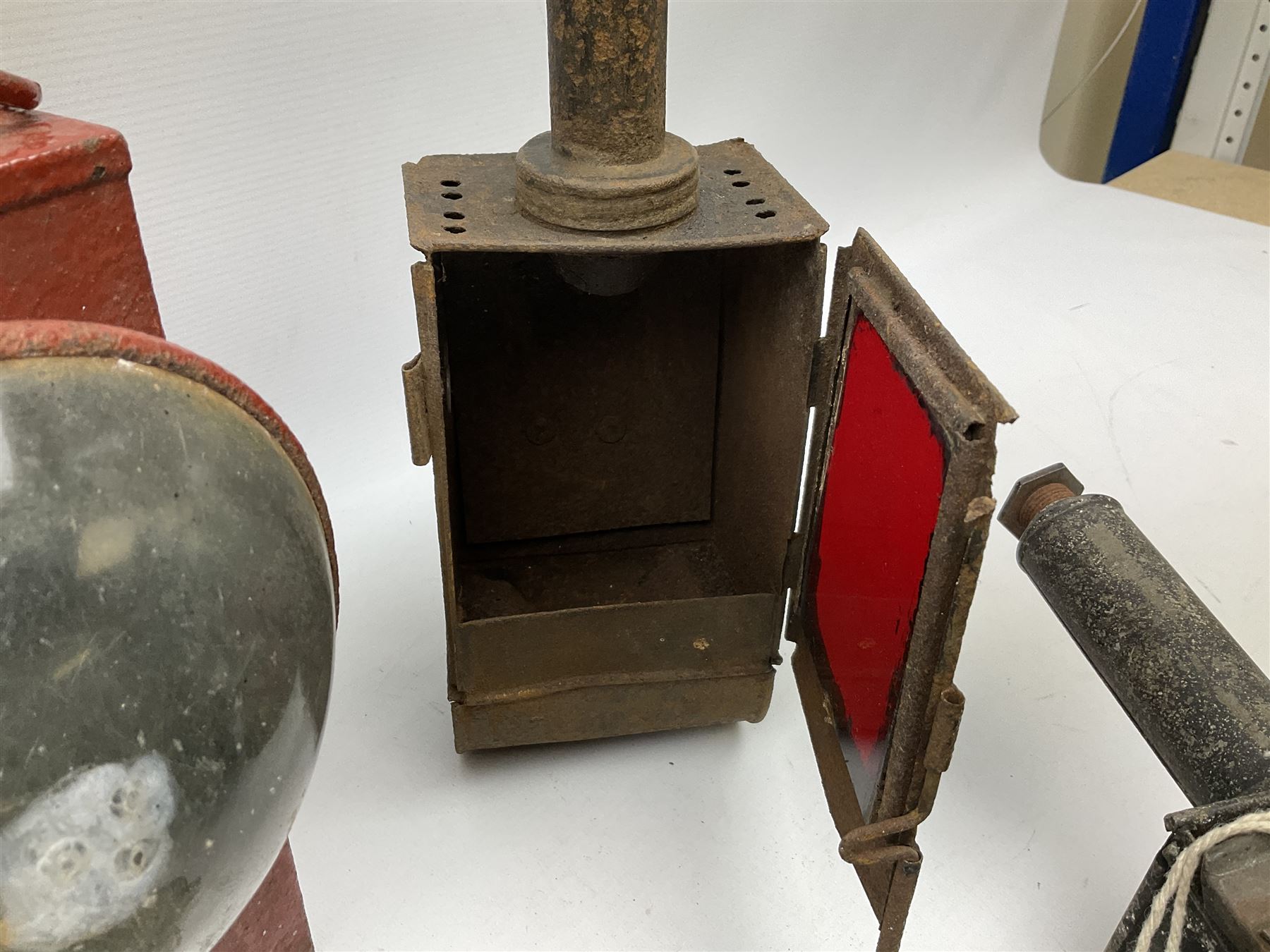 Collection of cast iron lamps, predominantly railway and coach examples, to include John Phillips Light of London Lamp Co coach lamp and Lito bicycle lamp by Miller & Co of Birmingham, etc