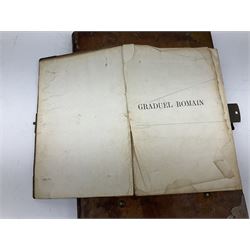 Six 19th century leather bound books of music comprising Graduale Juxta Missale Romanum and Antiphonarium Romanum. Both 1828 Divione; Graduel Romain and Psautier Romain. Both 1859 Digne/Paris; Graduel Romain. 1872 Marseille; and Missale Romanum. 1853 Mechliniae (6)