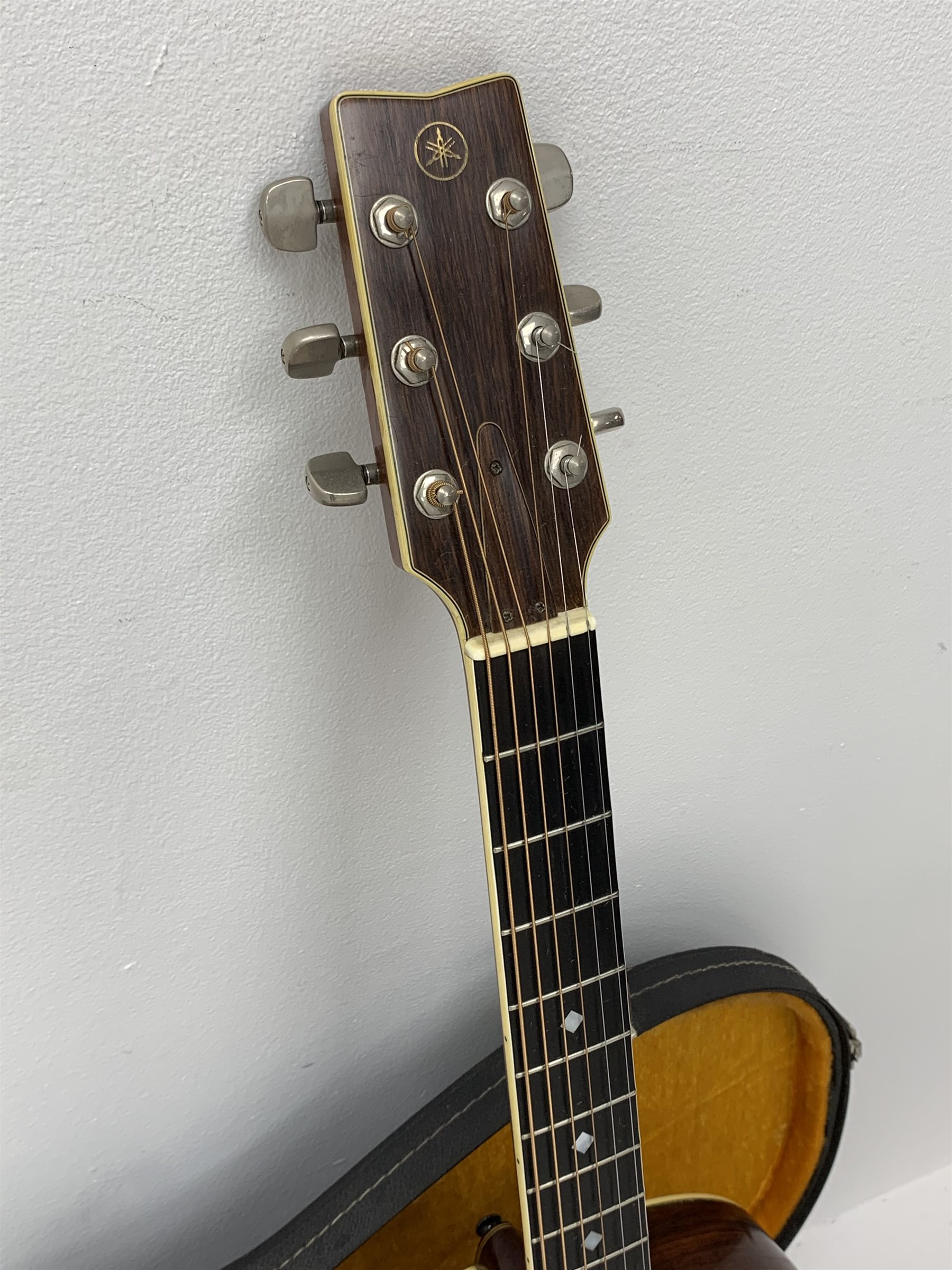 Rare Yamaha FG-1200J acoustic guitar, spruce top, solid Jacaranda back and sides, ebony fret board, mother-of-pearl bound top, three-piece back with abalone trim, in carrying case