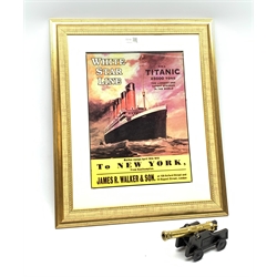 Brass model cannon on cast iron carriage dated 1796 L20cm; together with a framed reproduction poster for the maiden voyage of R.M.S. Titanic from Southampton to New York 39 x 29cm (2)