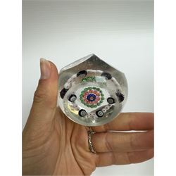 Glass Millefiori paperweight of hexagonal faceted form, H5cm