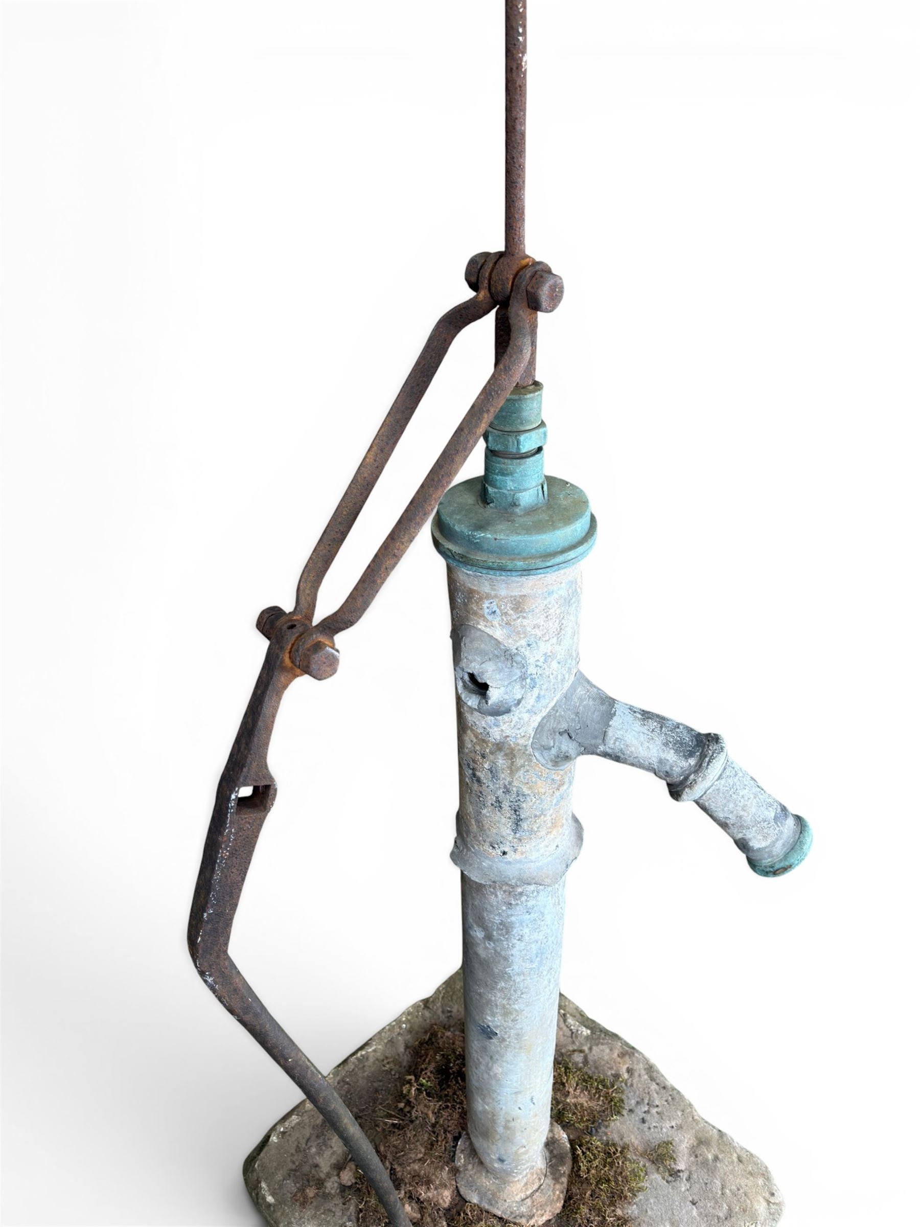 Georgian period lead garden water pump, with iron handle, set in square stone base
