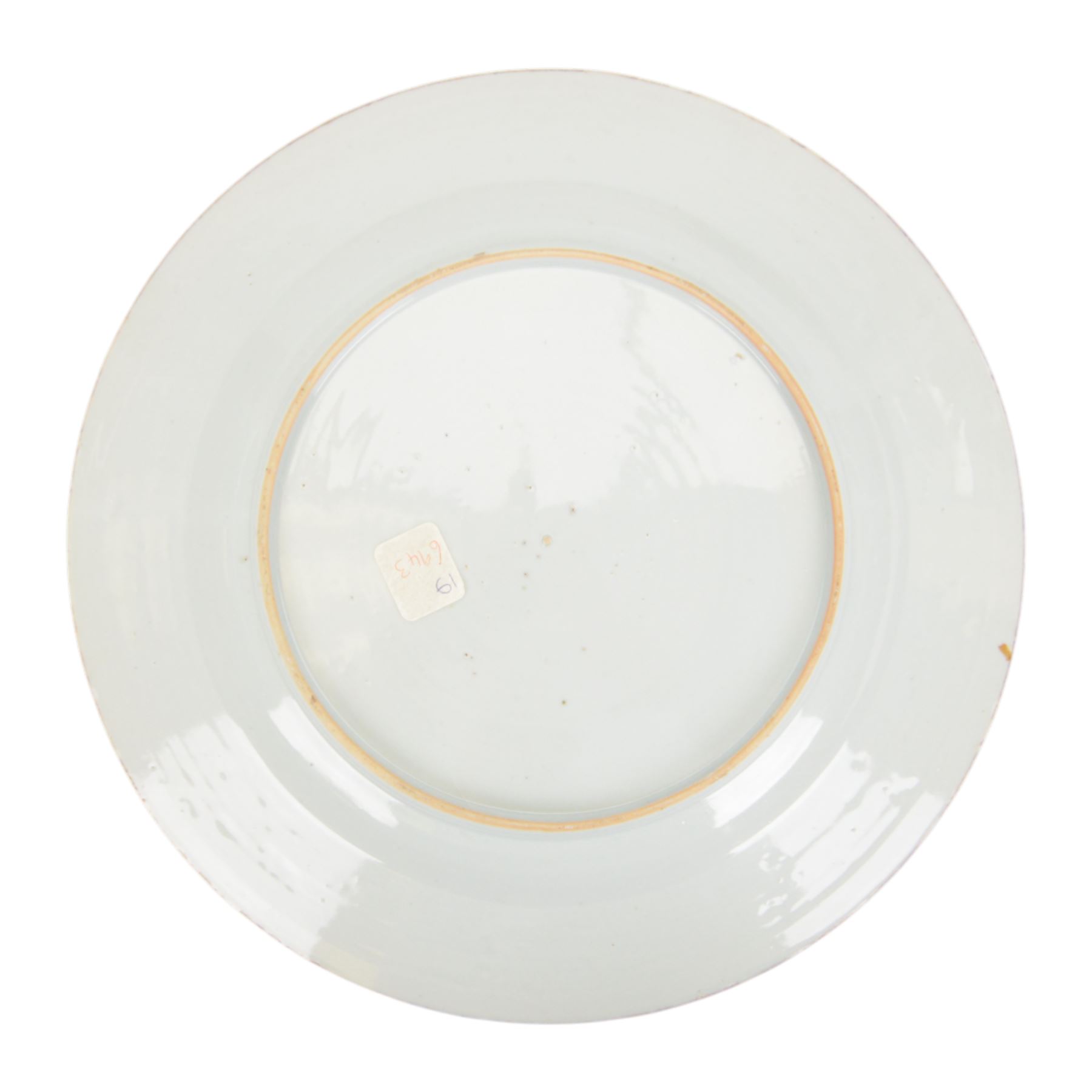19th century Cantonese plate of octagonal form decorated to the centre with a garden of flowering peonies, together with two other 19th century plates and two serving platters each depicting temples in landscapes, octagonal plate W31cm  