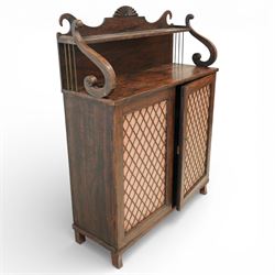 Regency simulated rosewood chiffonier, with shaped scroll supports and shell carved cresting, over a pair of panelled doors inset with diamond lattice glazing, enclosing a shelved interior, raised on short turned feet