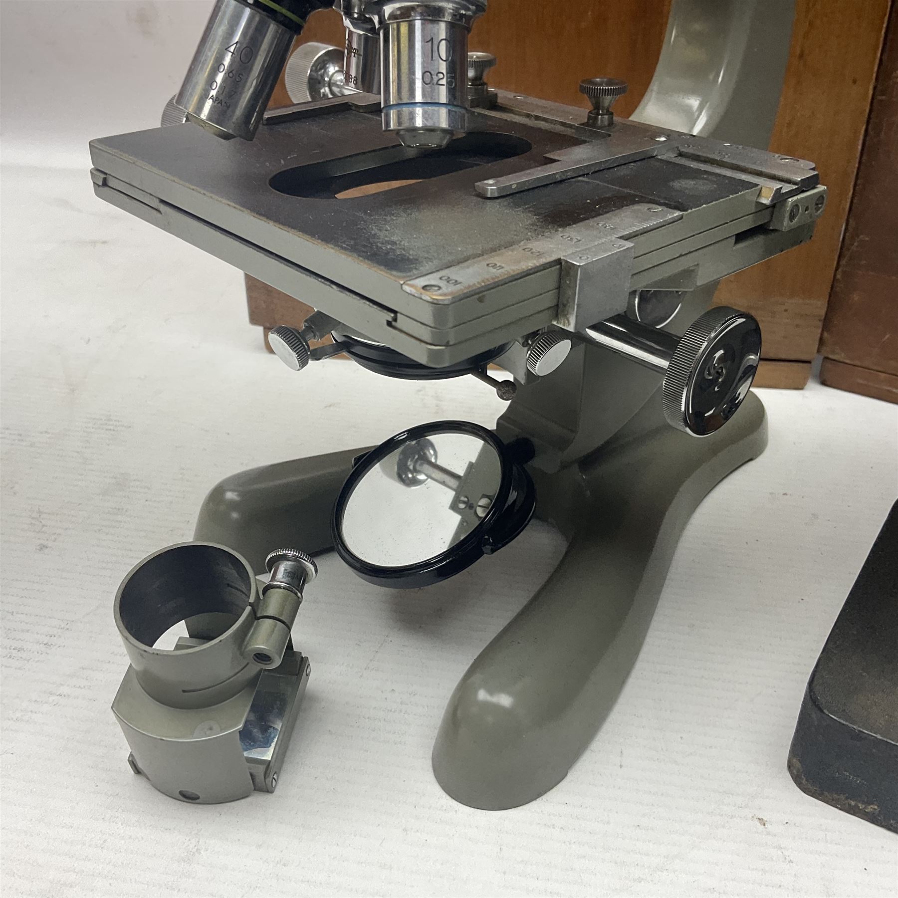 Four microscopes, including Cooke, Troughton & Simms no M467926, W Watson & Sons no 114758, W & J George & Beck Ltd no 36649 and one other 