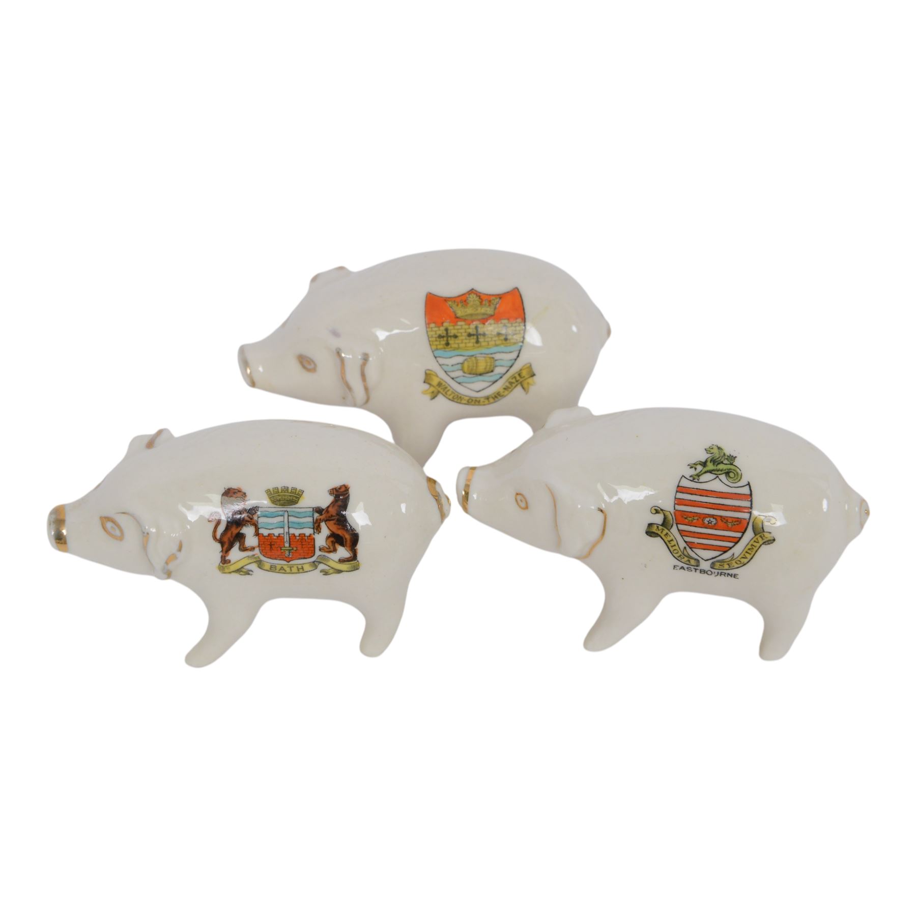 Large collection of Crested Ware pigs, including examples from Southport, Layton, Tottenham Whitby etc 